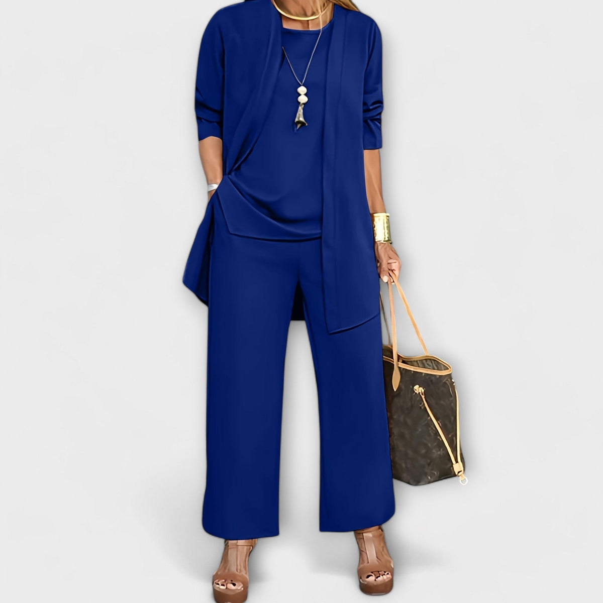 Three-piece top and wide-leg pants set in blue