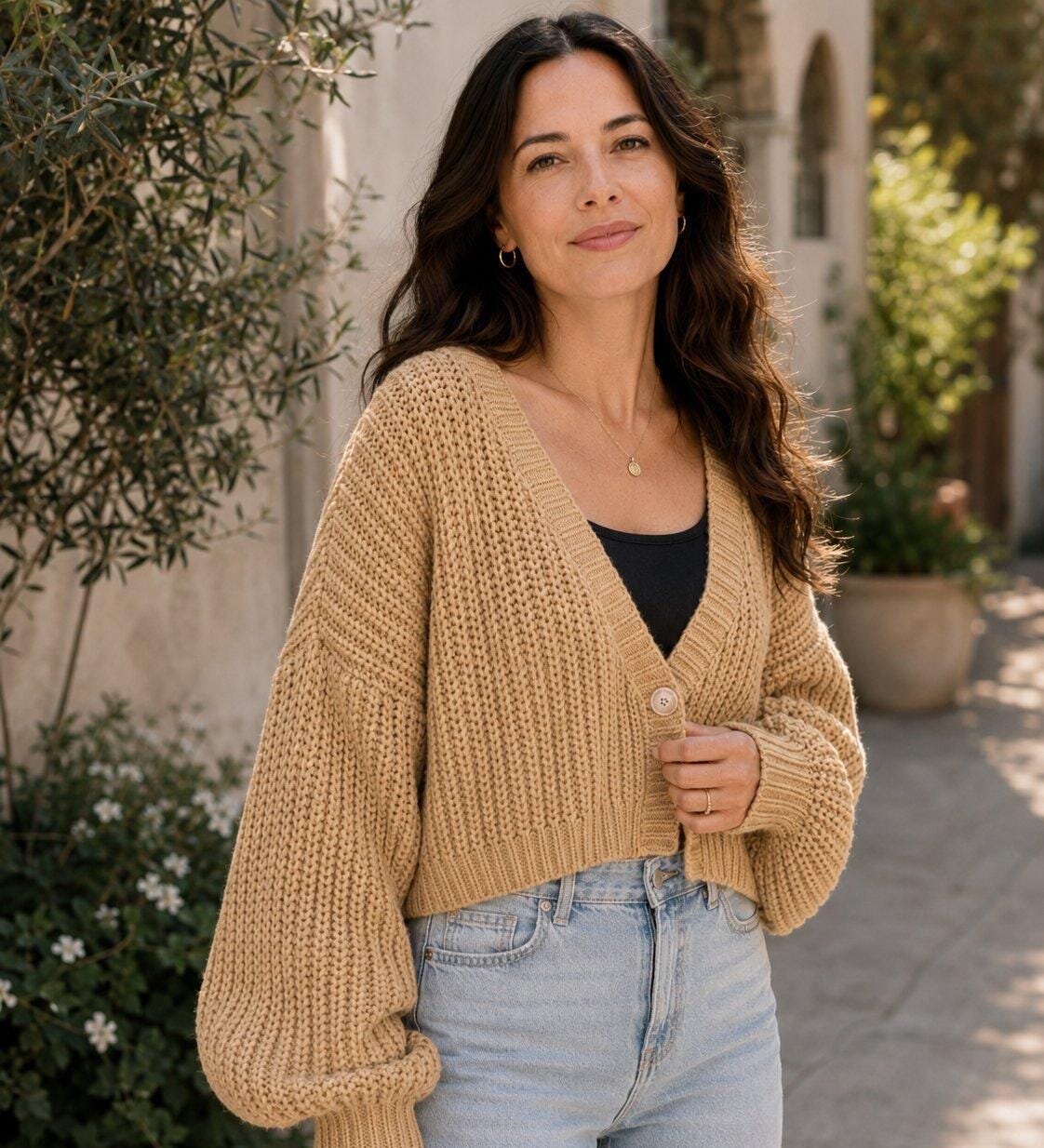 Cropped chunky knit cardigan sweater in beige