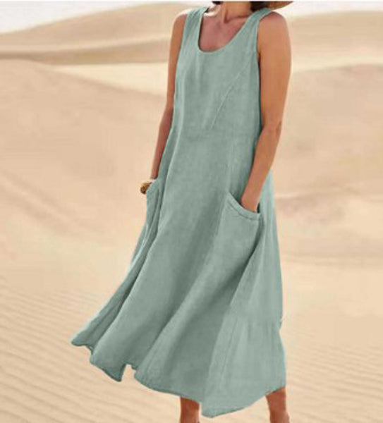 Cotton women's dress featuring a relaxed fit, stylish pockets, and a comfortable design, perfect for casual outings or everyday wear. 7