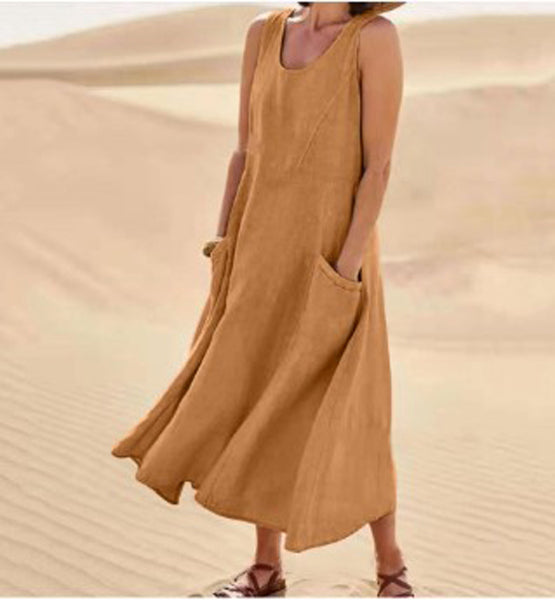 Cotton women's dress featuring a relaxed fit, stylish pockets, and a comfortable design, perfect for casual outings or everyday wear. 8