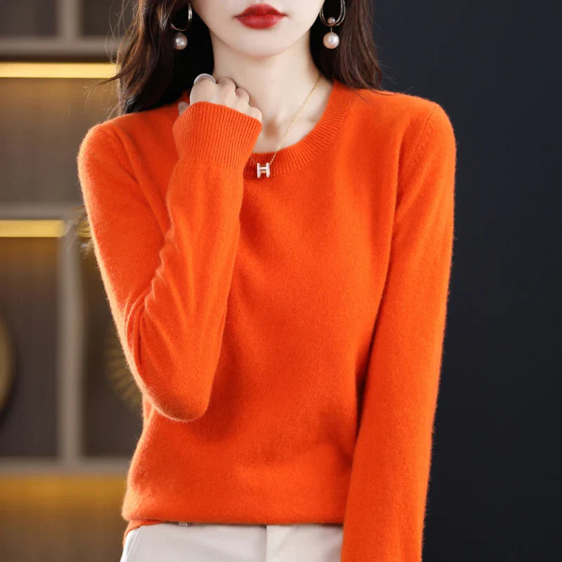 Women's adorable oversized knit sweater for fall and winter in orange