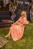 Floral print long summer dress featuring a defined waist design, perfect for warm weather outings and casual events. 2