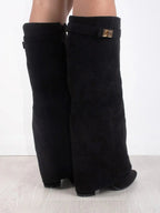 Knee high boots with a stylish flared top and comfortable block heel, perfect for fashionable fall and winter outfits. 5