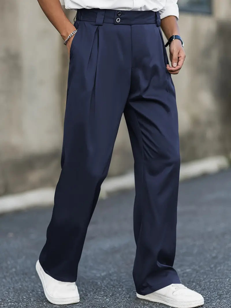Loose-fitting wide leg trousers featuring stylish pleats and a double waistband, perfect for a comfortable yet fashionable look. 1