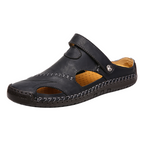 Men's sandals featuring ventilation holes for breathability and an adjustable closure for a secure fit, perfect for outdoor activities and casual wear. 0