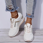 Orthopedic women's sneaker featuring arch support and cushioning for enhanced comfort and stability during daily activities. 6