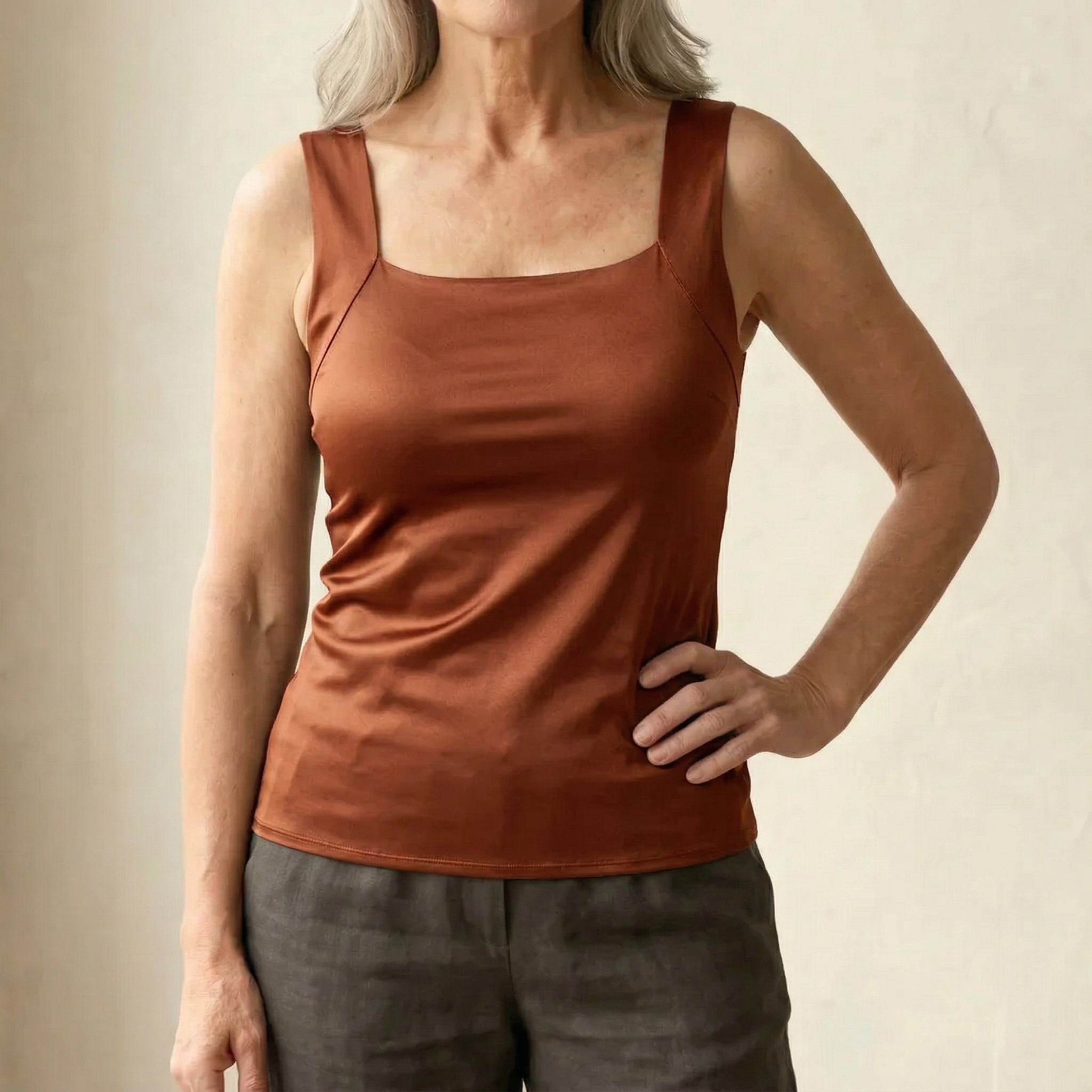 Women’s tank top featuring a built-in bra, designed with breathable fabric for ultimate comfort and support during workouts or casual wear. 14