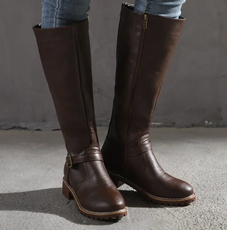 Stylish women's boots featuring a removable footbed and shock-absorbing sole, designed for comfortable everyday wear. 6