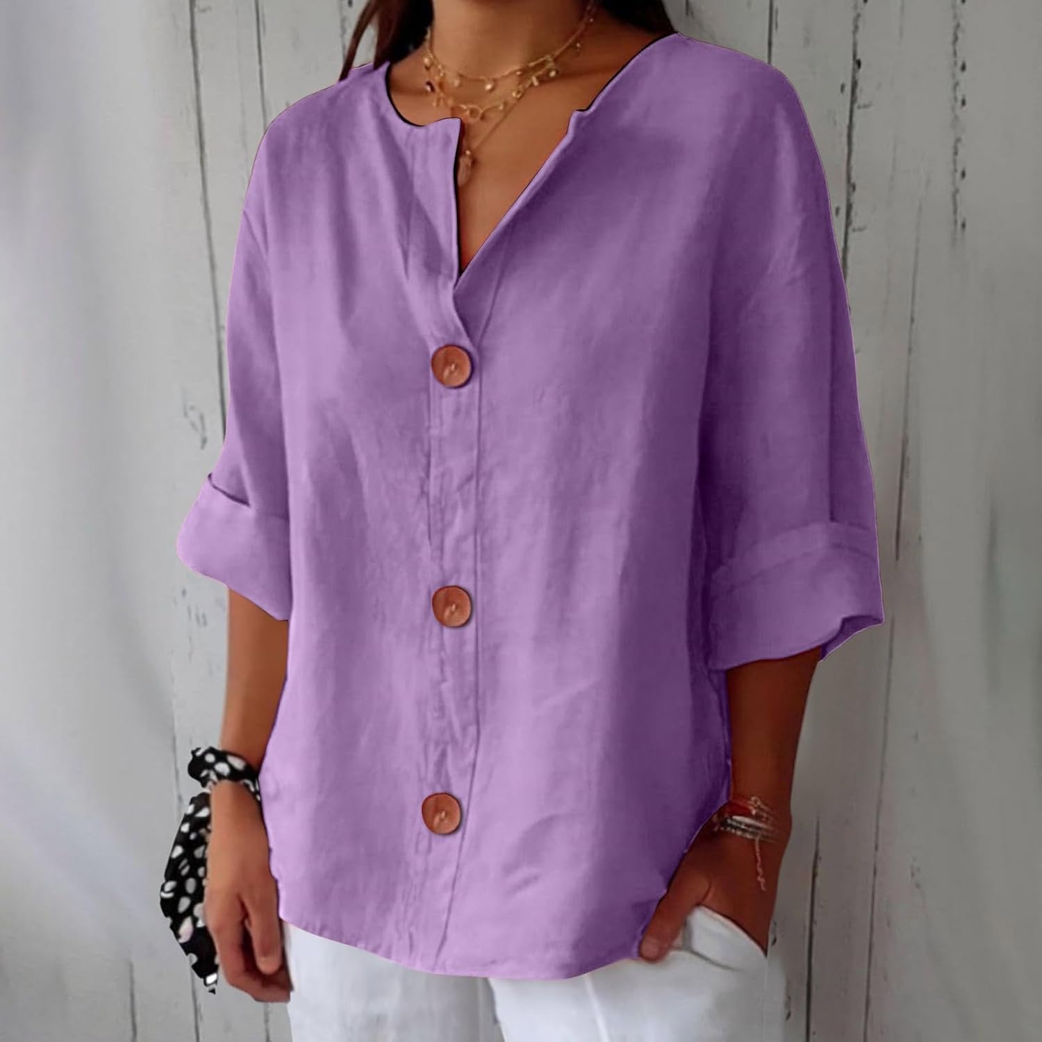 Women's loose fit blouse in lightweight summer linen, perfect for casual outings, featuring a relaxed silhouette and breathable fabric for comfort. 10