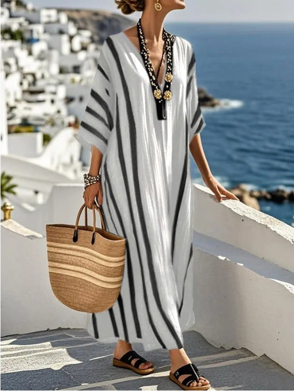 Women's plus size maxi kaftan dress in vibrant colors, perfect for summer occasions, featuring a flowy silhouette and lightweight fabric for comfort and style. 4