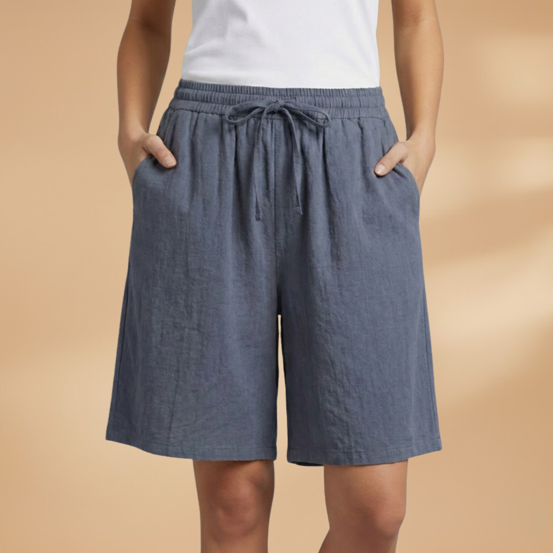 Women's relaxed fit knee-length shorts in a stylish design, perfect for casual outings and summer wear. 10