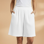 Women's relaxed fit knee-length shorts in a stylish design, perfect for casual outings and summer wear. 11