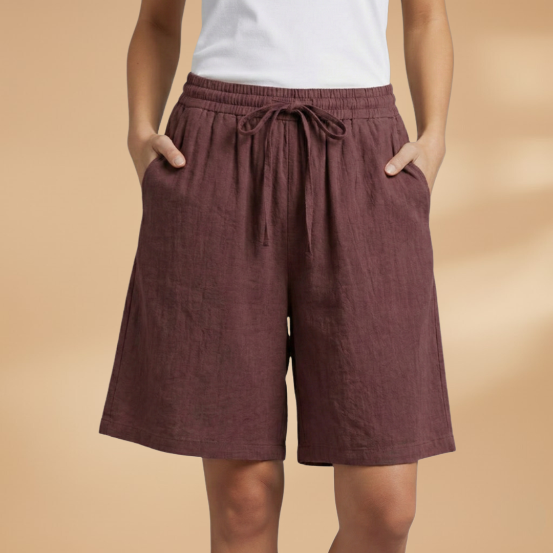 Women's relaxed fit knee-length shorts in a stylish design, perfect for casual outings and summer wear. 13