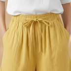 Women's relaxed fit knee-length shorts in a stylish design, perfect for casual outings and summer wear. 6