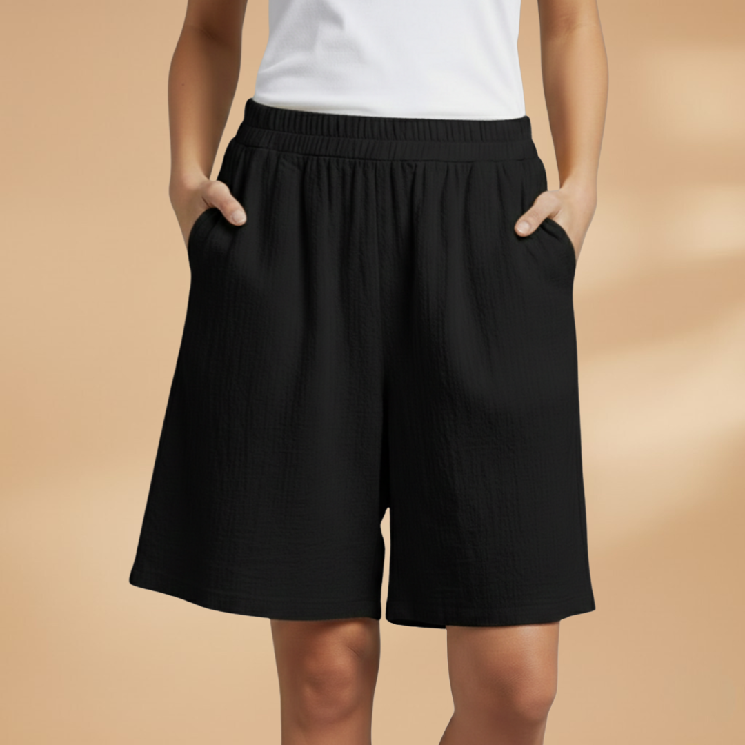 Women's relaxed fit knee-length shorts in a stylish design, perfect for casual outings and summer wear. 9