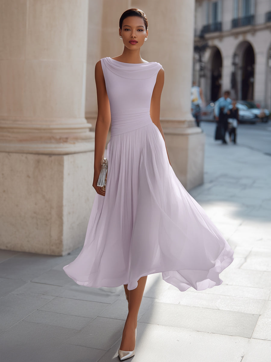 Women's sleeveless pleated midi dress in plus size, perfect for formal cocktails, featuring a flattering silhouette and elegant design. 10