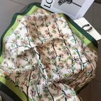 Women's square silk scarf featuring a luxurious design, ideal for versatile styling and elegant occasions, showcasing vibrant colors and a smooth texture. 5
