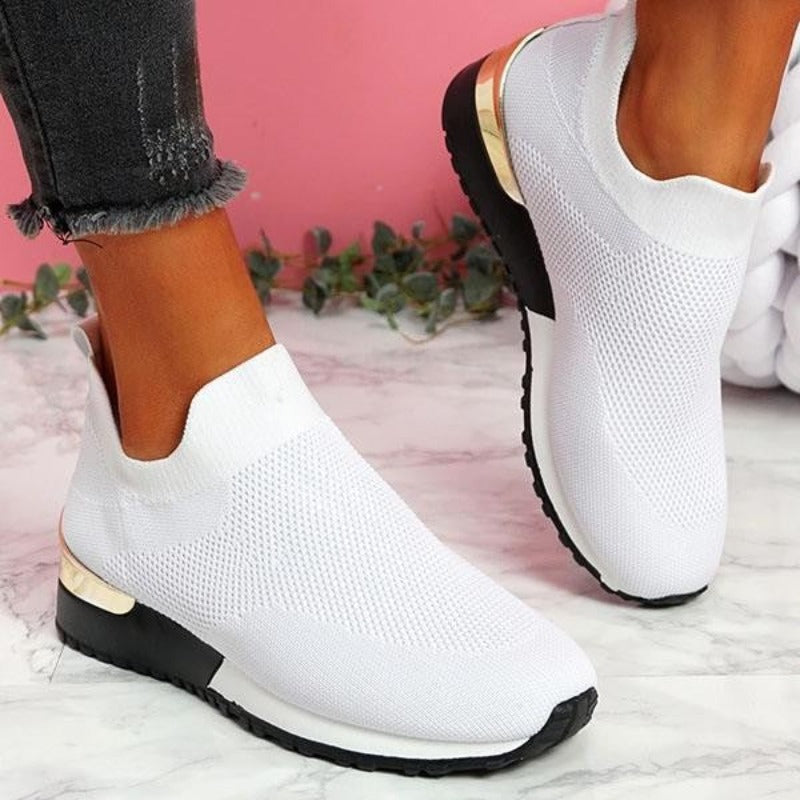 Knit slip-on walking sneakers in white