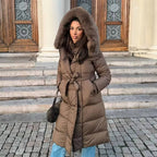 Warm longline puffer winter coat with faux fur hood in brown