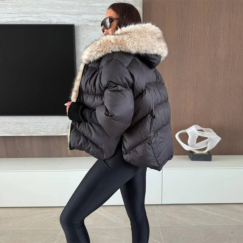 Warm longline puffer winter coat with faux fur hood